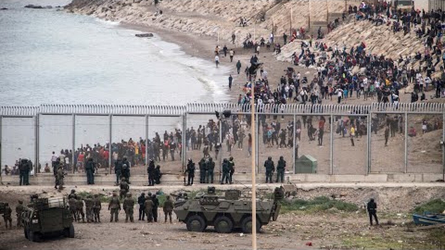 Ceuta: Children among thousands of migrants in desperate swim from Morocco to Spanish enclave