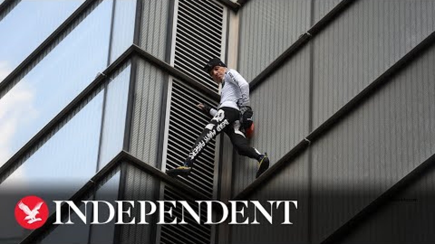 Live: French 'Spiderman' Alain Robert climbs skyscraper