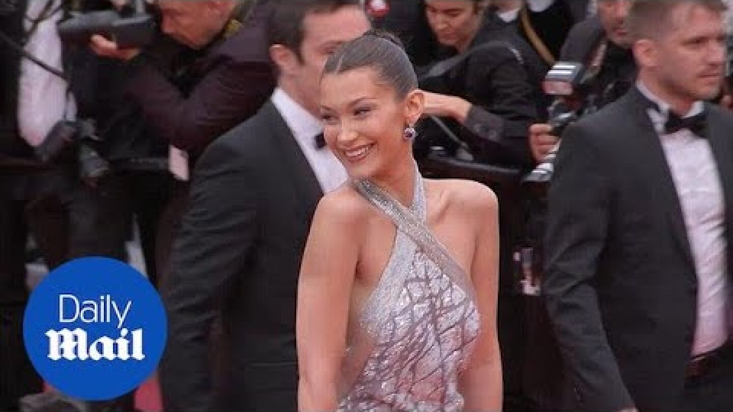 Bella Hadid dazzles in skintight silver dress on Cannes red carpet - Daily Mail