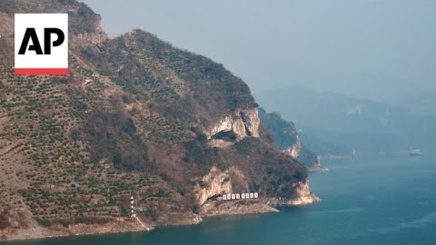 ‘Puppy Mountain’ photo draws onlookers to a Chinese riverside