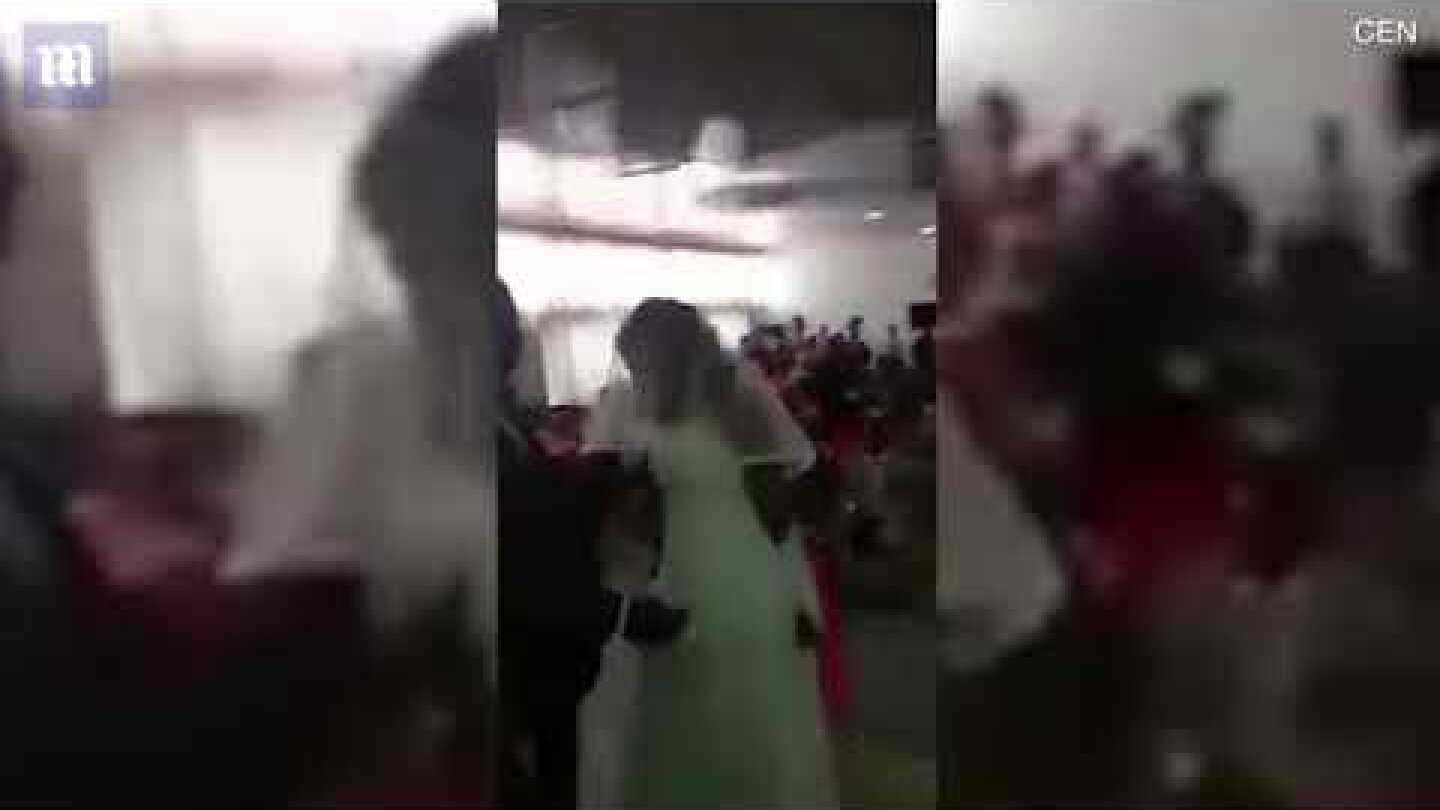 Spurned girlfriend gatecrashes her boyfriend's wedding to his new love .