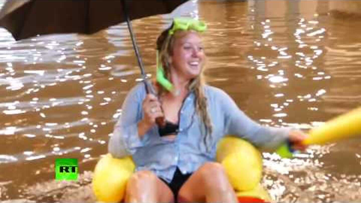 When life gives you heavy rain... turn it into big public swimming pool!