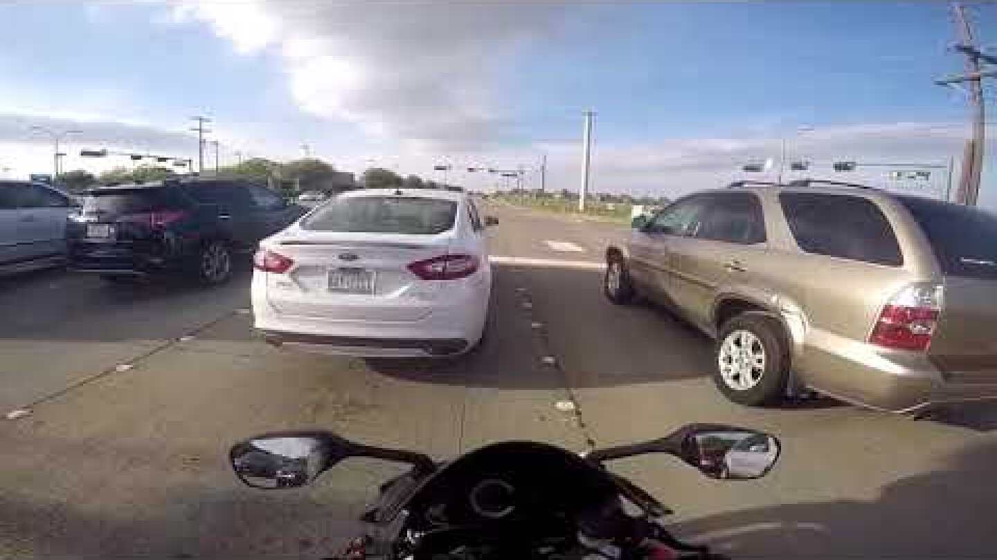 RAW: Plano motorcyclist captures close-call wreck on GoPro