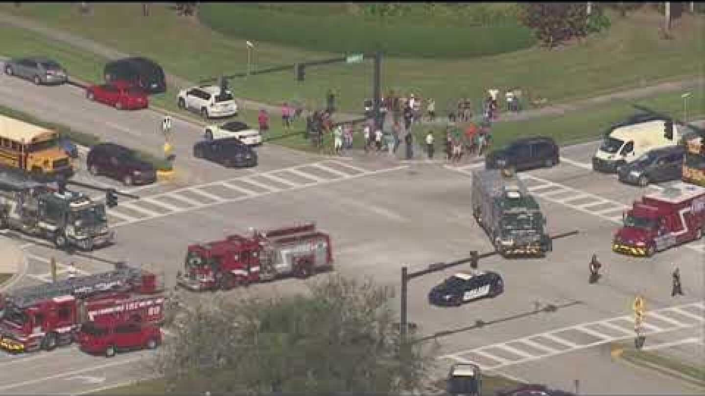 Person being taken out on stretcher at scene of school shooting - Parkland, Florida