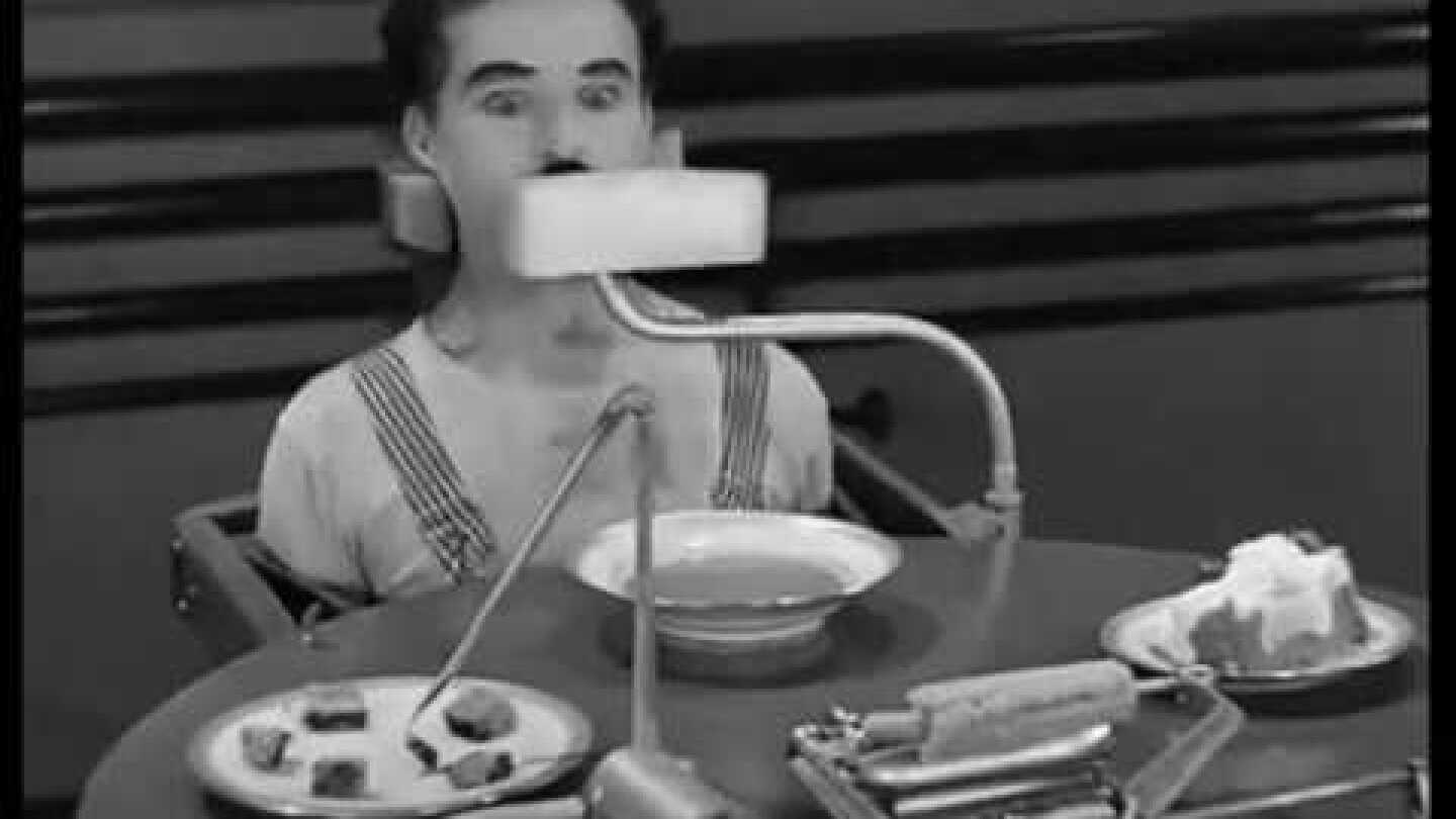 Τσάρλι Τσάπλιν από την ταινία 'Μοντέρνοι Καιροί' 1936  Μηχανή ταίσματος