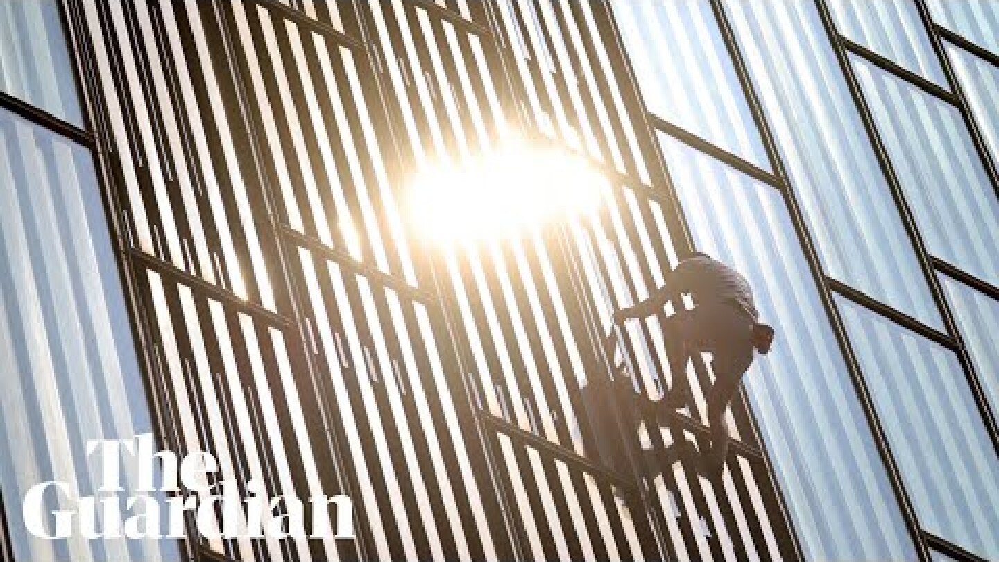 Shard freeclimber George King scales Barcelona skyscraper