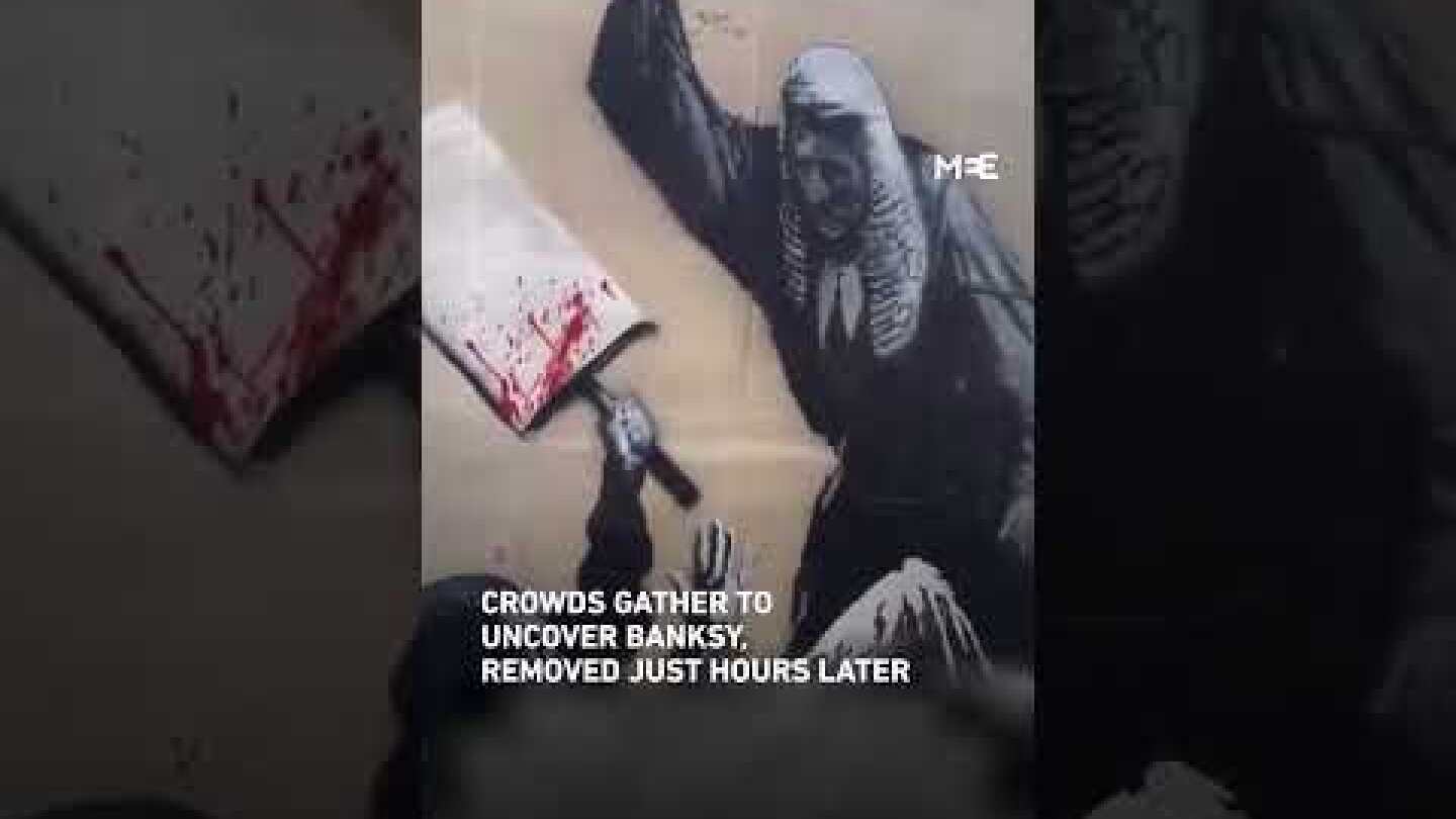 Banksy protester mural at London’s Royal Courts of Justice removed after attempts to remove barriers