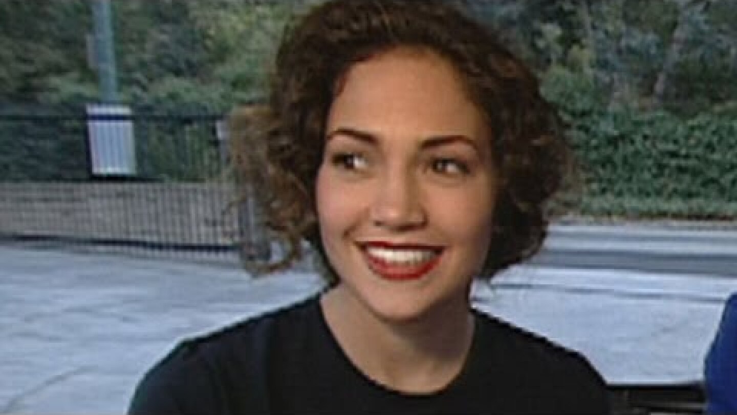 John Tesh Hilariously Crashes Jennifer Lopez's First ET Interview... On a Motorcycle.