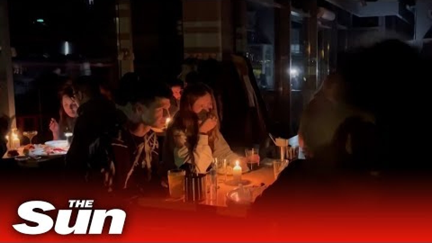'Nothing can break us': Ukrainians turn to candles as power cuts grip nation