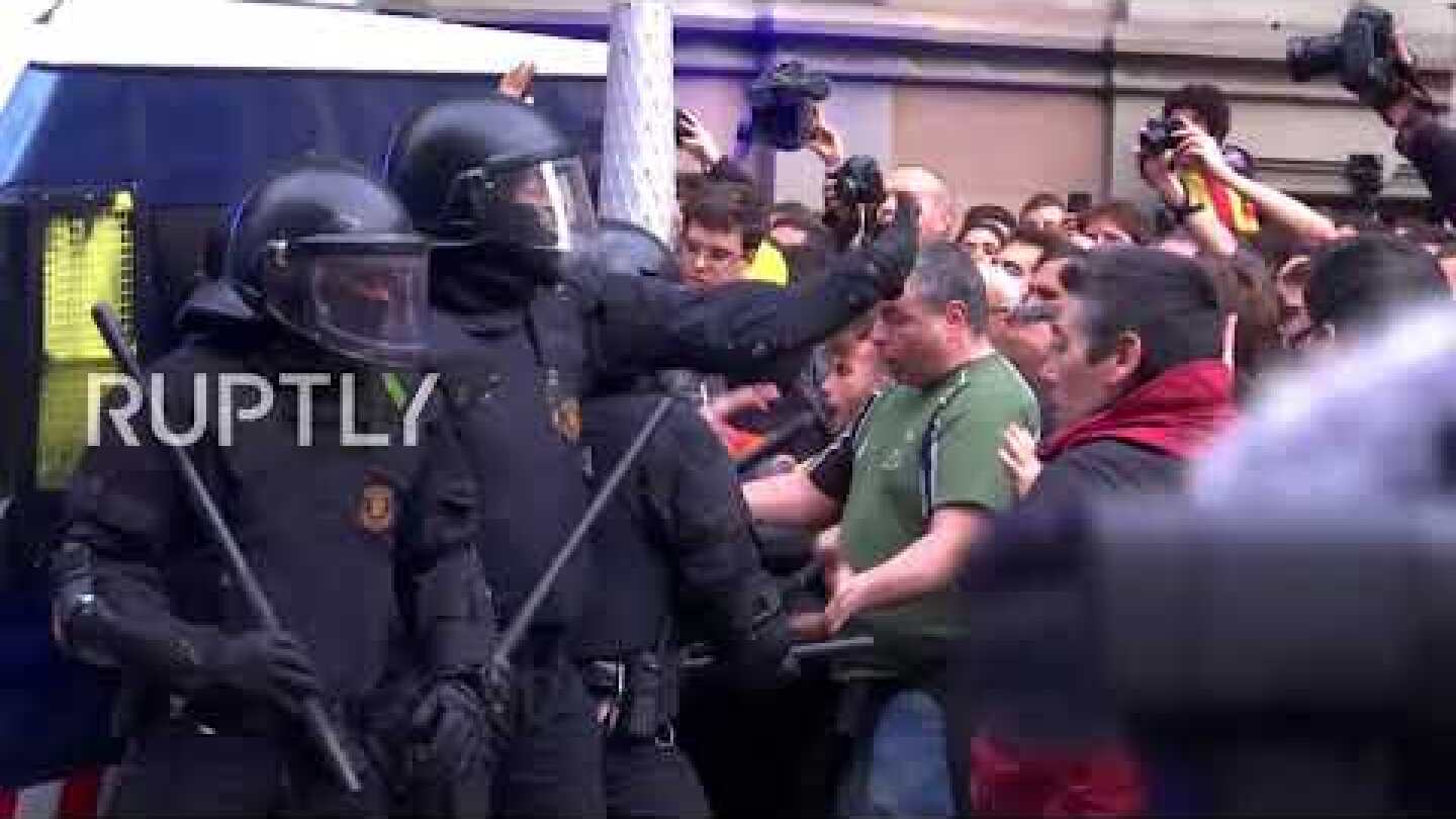 Spain: Catalan protesters clash with police in mass demo after Puigdemont arrest