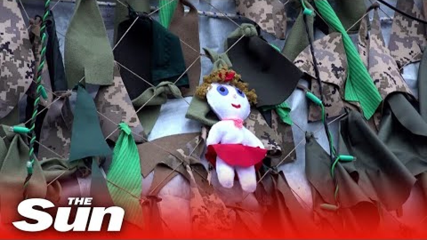 Ukraine wartime Christmas tree made of camouflage nets on show in Mykolaiv