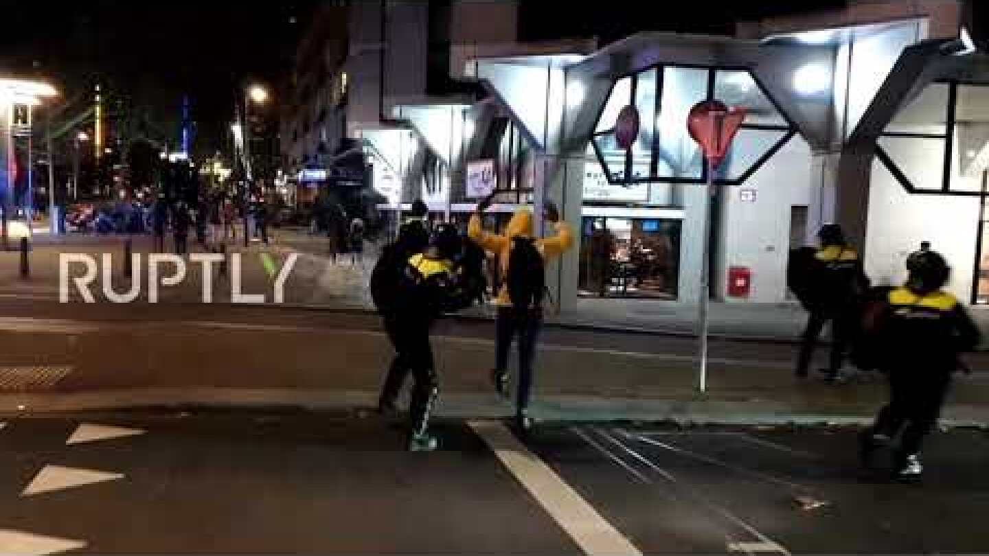 Netherlands: Police use batons to disperse anti-COVID restrix protesters in Rotterdam