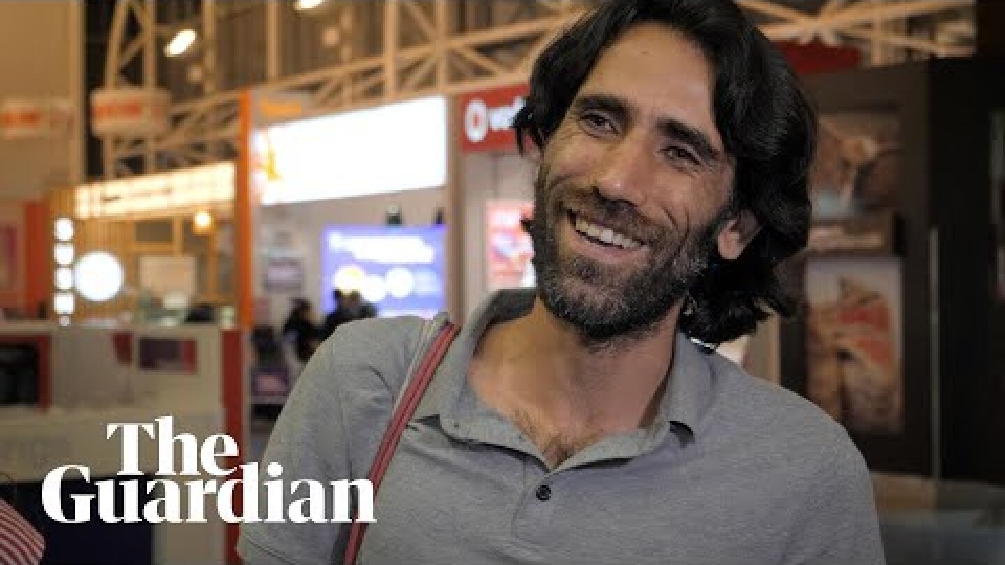 Behrouz Boochani welcomed to freedom in New Zealand as he arrives at Auckland airport