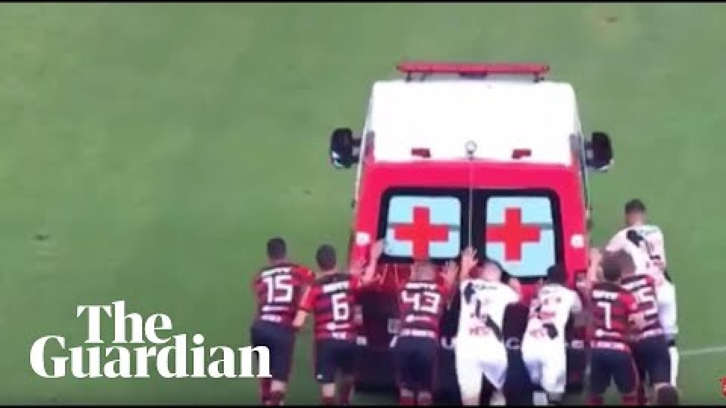 Footballers push ambulance from pitch in Brazil after it fails to start