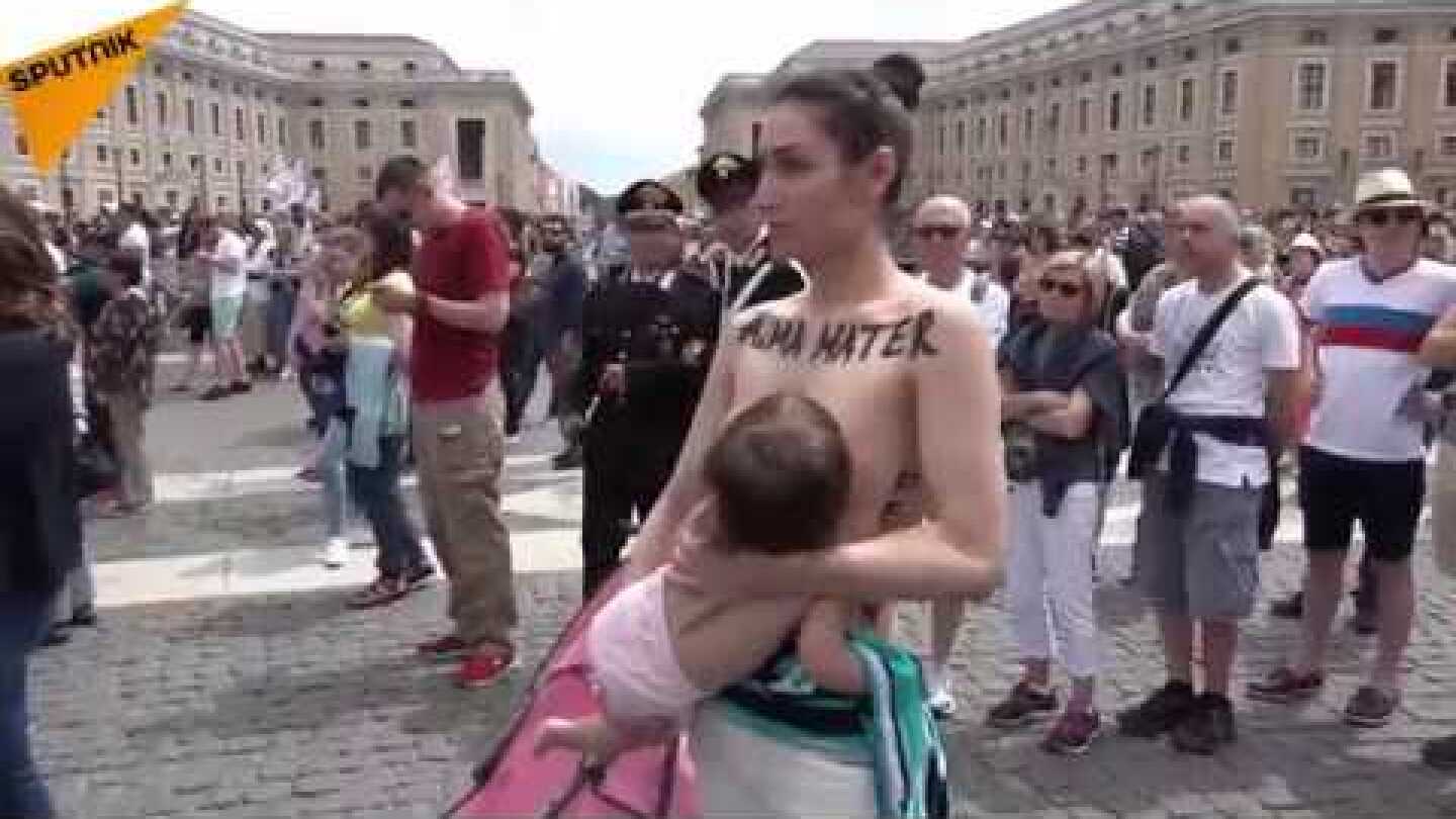 Vatican: FEMEN Activist Breastfeeds Baby in "Alma Mater" Protest