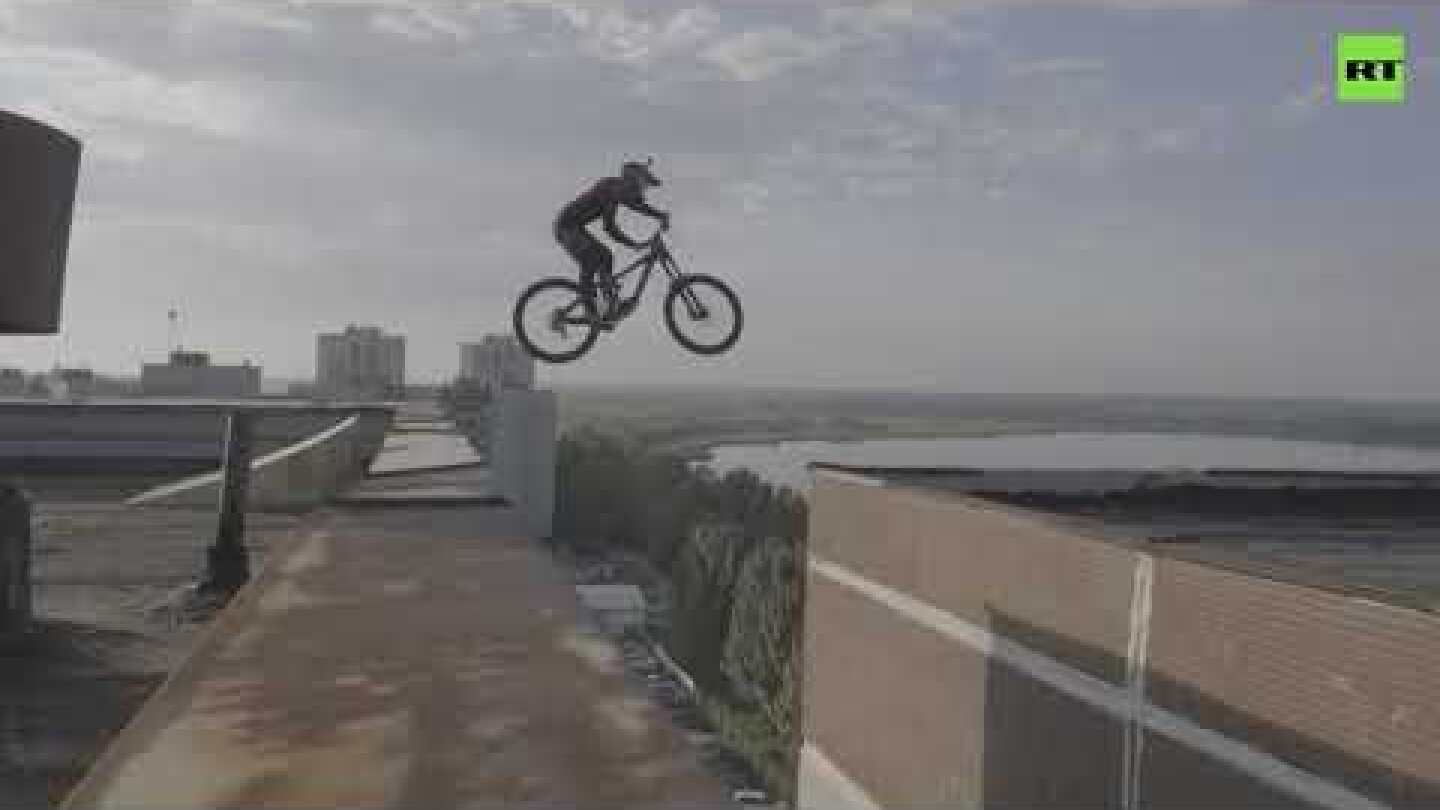 Russian man bike jumps between the rooftops of 10-storey buildings