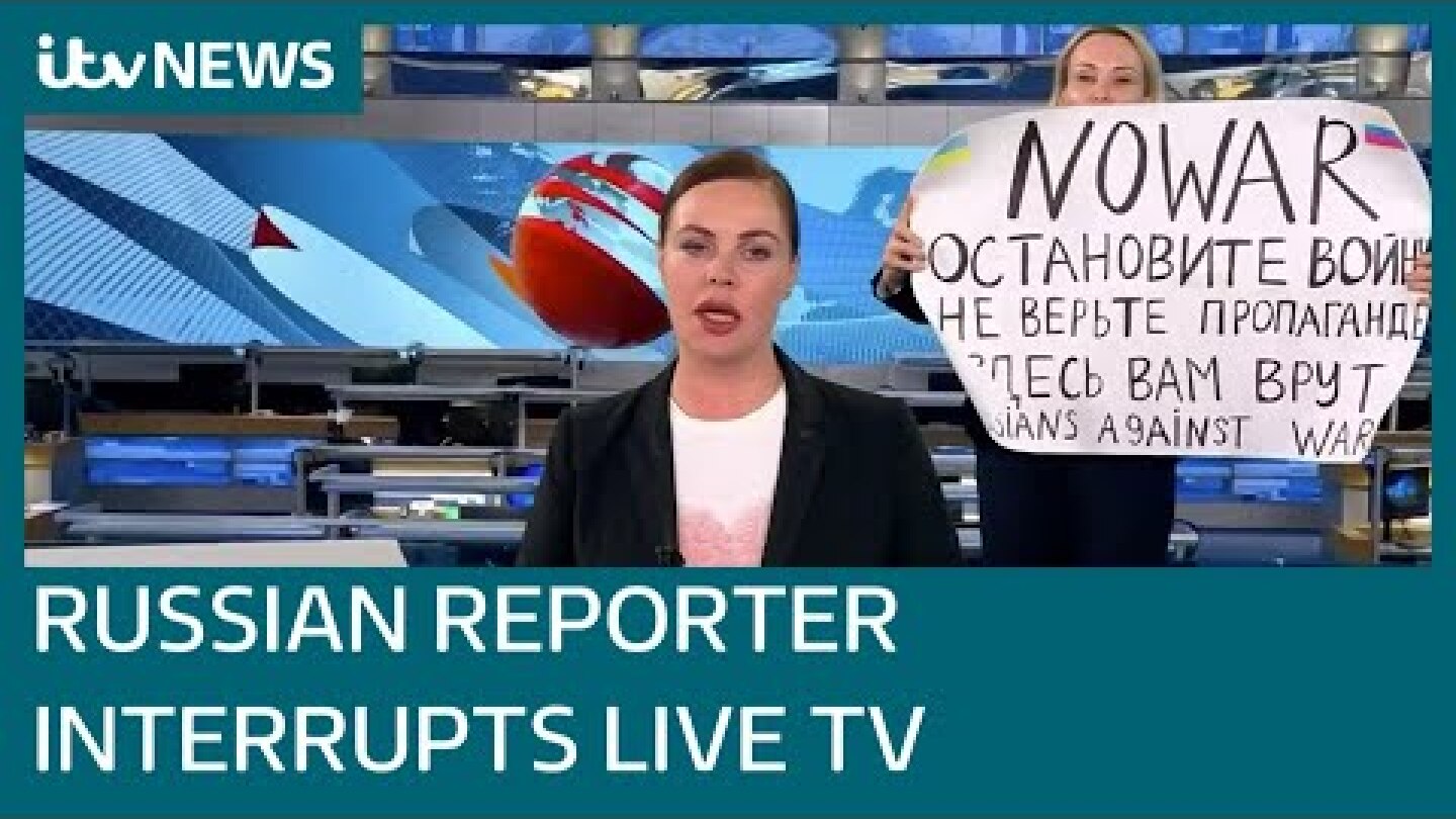Russian journalist interrupts live TV state media broadcast with 'no war' protest | ITV News