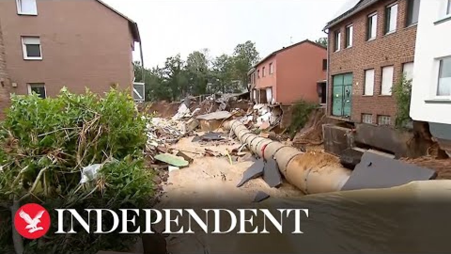 Deadly floods leave giant sinkhole in German town