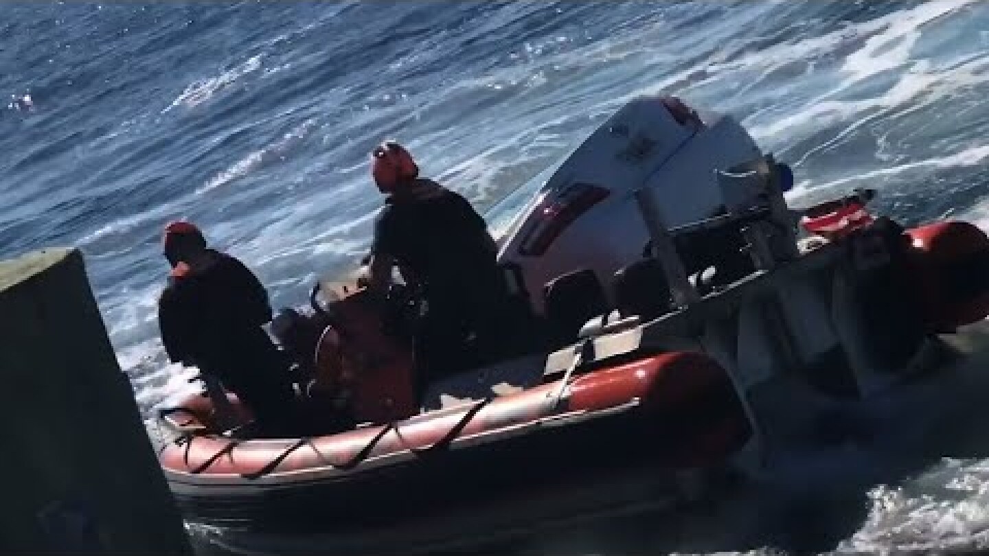Raw: US Coast Guard Rescues Man From Sinking Car