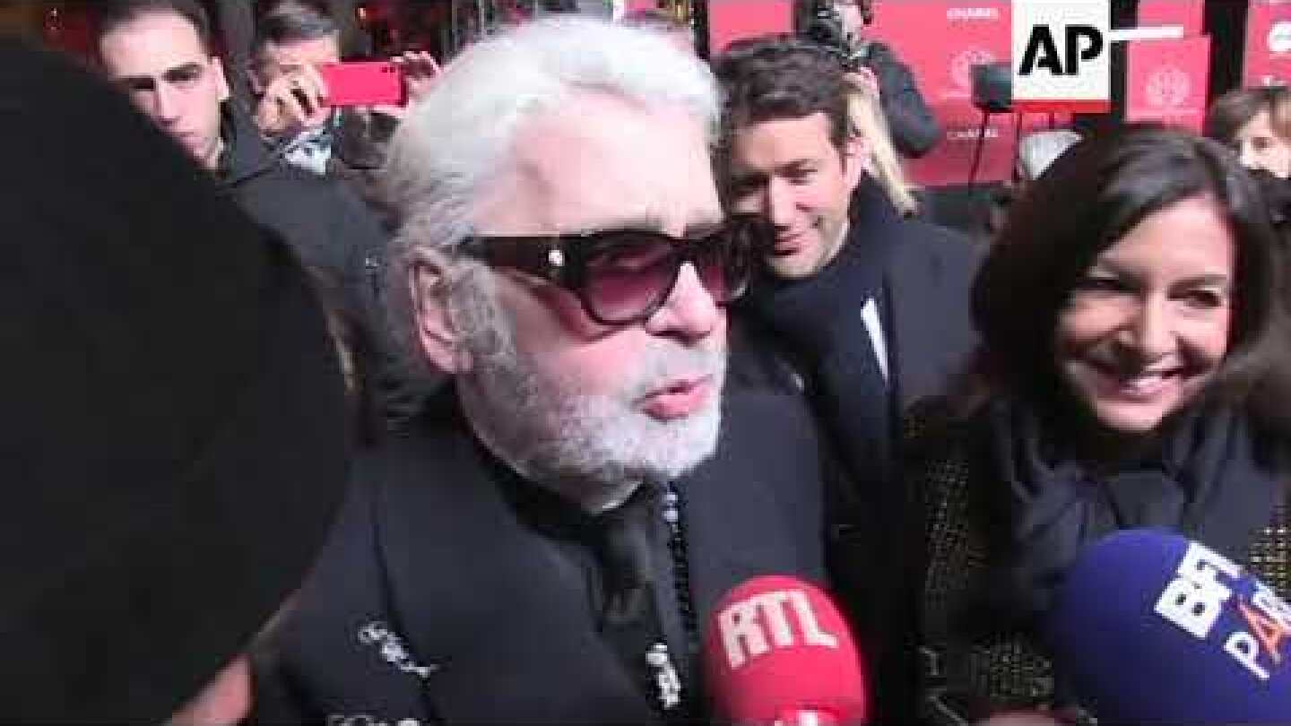 Karl Lagerfeld switches on Champs-Elysee Christmas lights