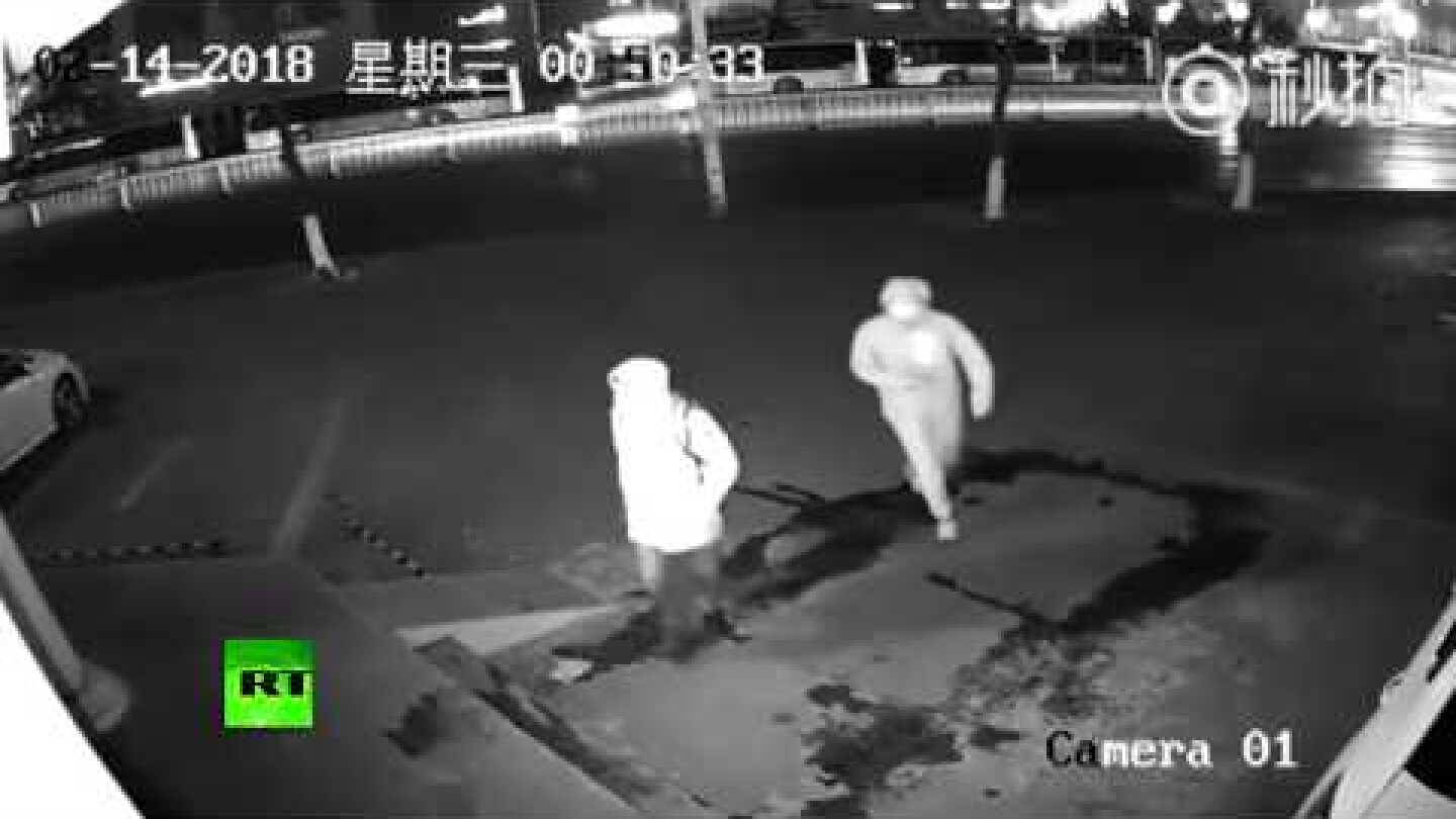 Dumbest burglars ever? Surveillance footage of failed robbery released by Shanghai police
