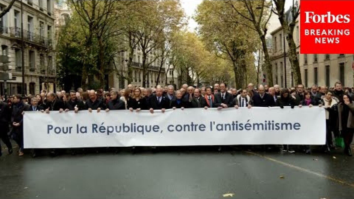 WATCH: French Politicians Join Antisemitism Protest In Paris, France