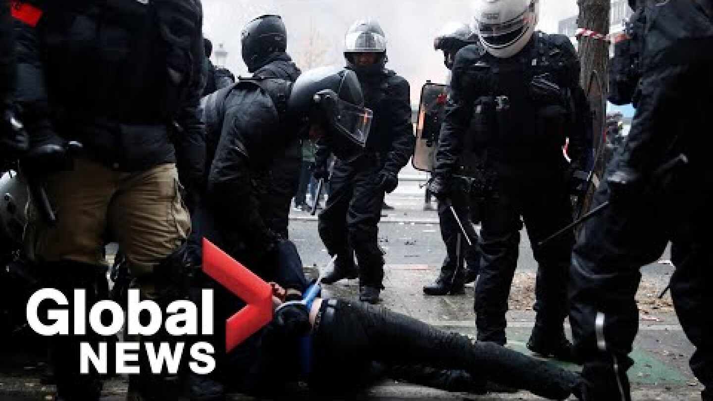 Video captures violent scuffle between French police and "black blocs" in Paris protest