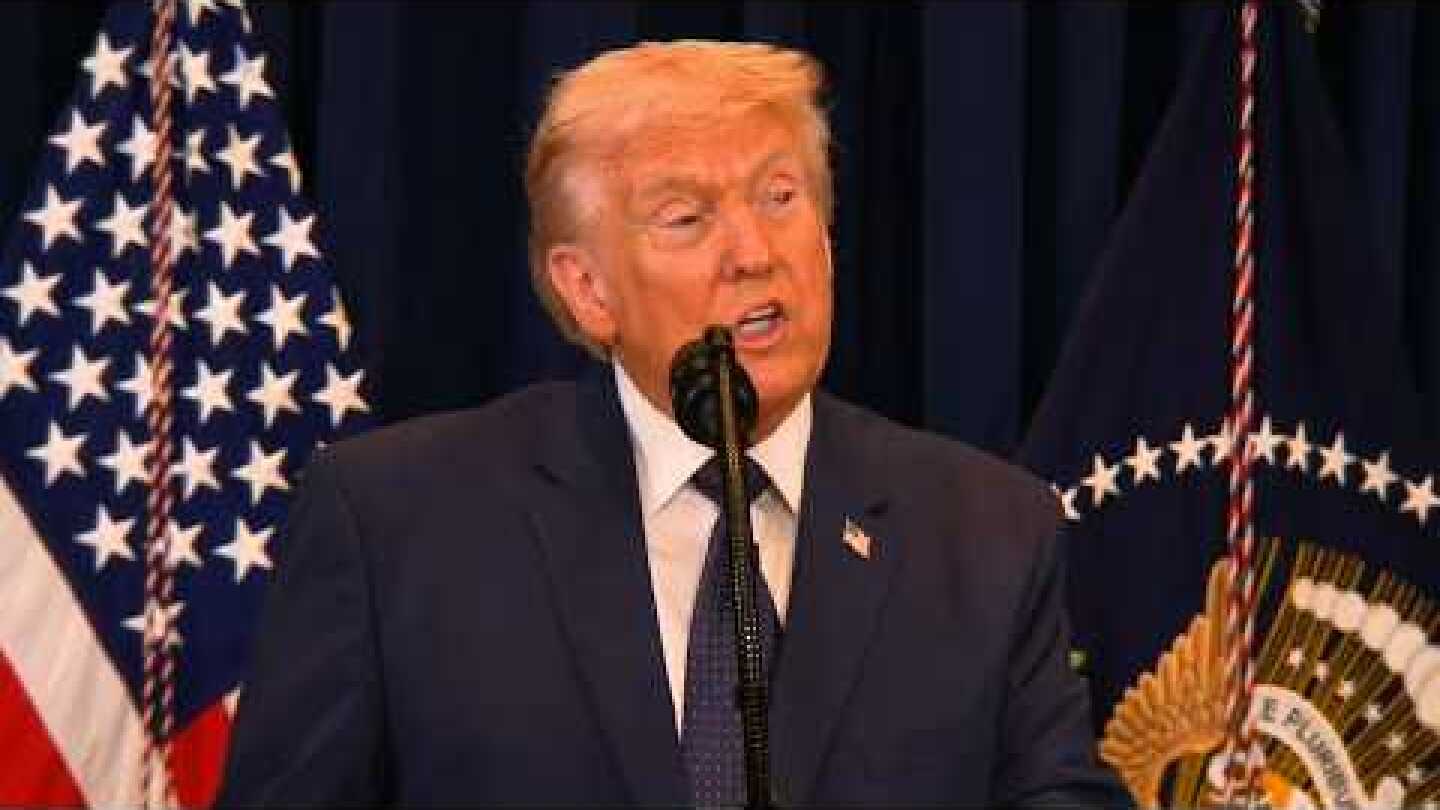 Donald Trump takes questions from reporters