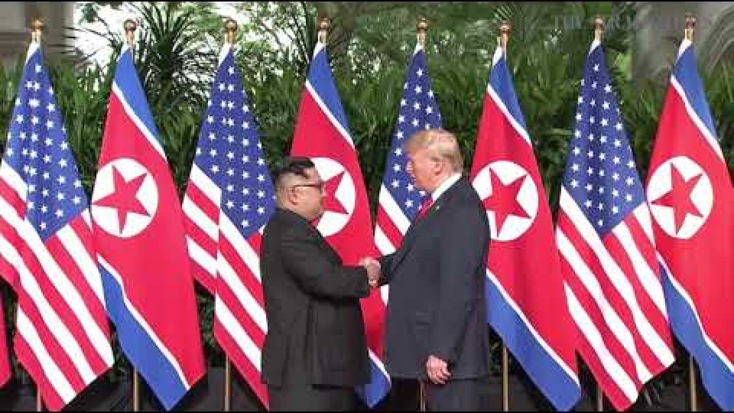 Trump-Kim summit: Donald Trump and Kim Jong Un exchange historic handshake
