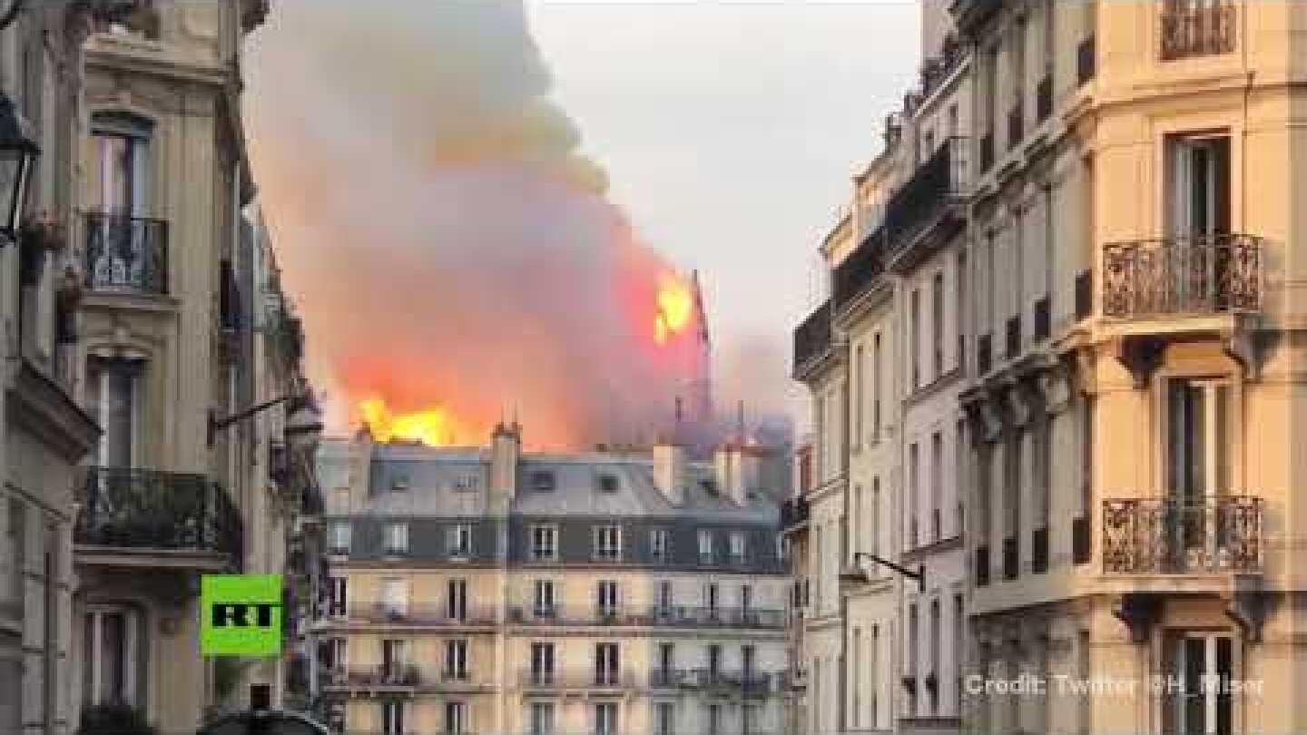 'It's falling!': Spire collapses as fire ravages Notre Dame cathedral