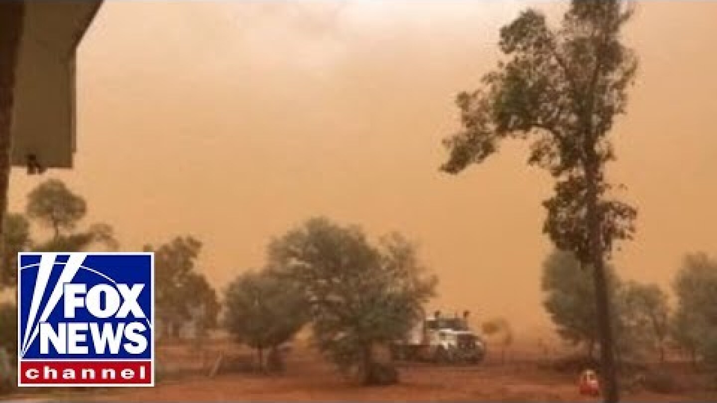 Dust storm covers Australia town in film of orange