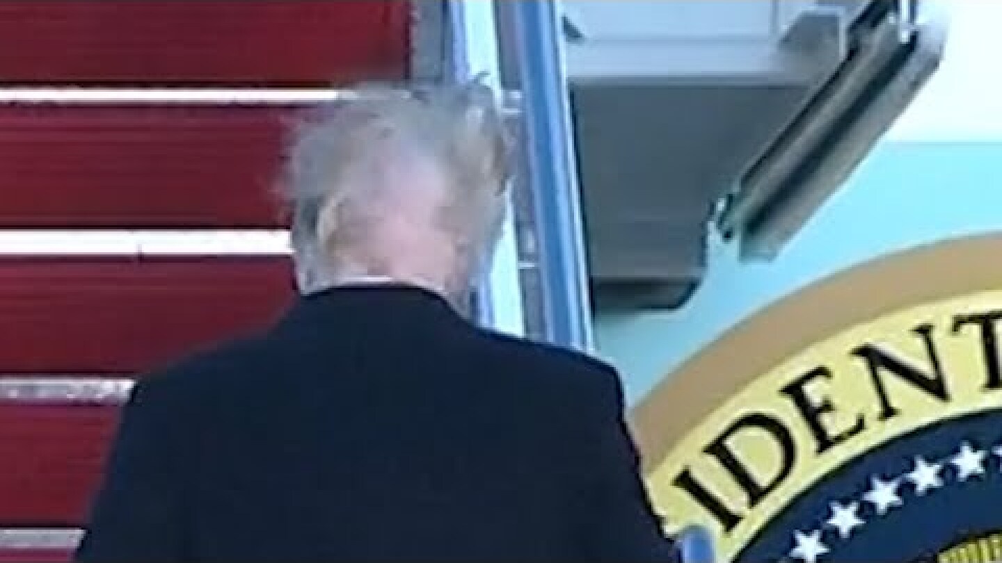 Donald Trump's hair blown apart by the wind
