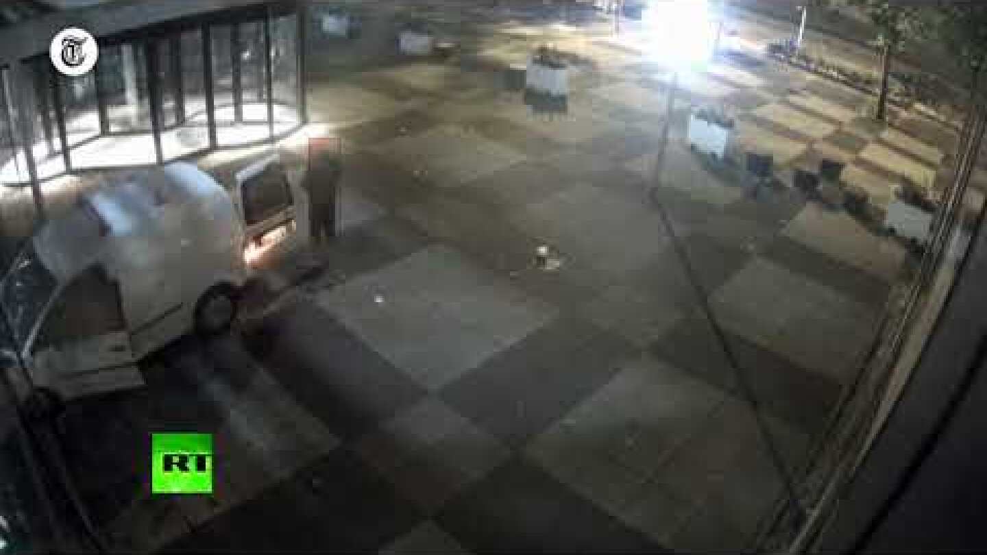Surveillance video of van attack on Dutch newspaper office