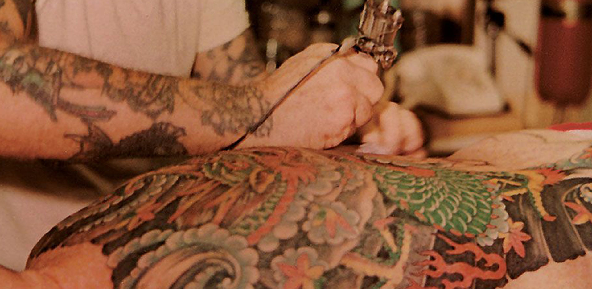 norman-collins-tattooing-back_0.jpg