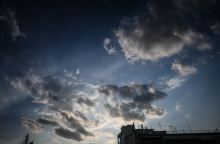 Ήλιος με σύννεφα