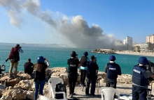 βομβαρδισμενη πολη, δημοσιογραφοι