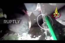 Heroic Italian firefighters rescue pup from perilous drainpipe