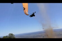 Dust devil sends paraglider flying