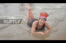 Dutch revellers begin the new year with ice cold swim