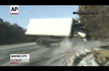 Dash camera shows close call on icy Illinois road