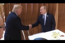 Donald Trump and Vladimir Putin shake hands for the first time