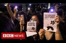 Hong Kong park lights up in sex abuse protest - BBC News
