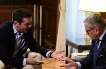 tsipras_regling.jpg