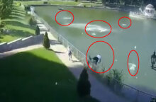 Περαστικός στο Κρεμεντσούκ της Ουκρανίας βουτά στη λίμνη για να γλιτώσει από τα ιπτάμενα συντρίμμια