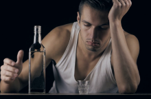 depressed-man-drinking-vodka-in-a-dark-room_bcs6hvp1l_thumbnail-full01.png