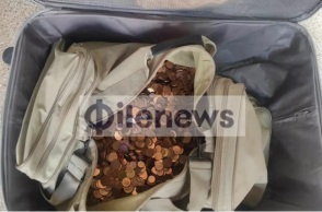 Λεμεσός: Νεαρός πήγε να πληρώσει πρόστιμο 500 ευρώ με 15.500 κέρματα των 1, 2, 5 και 10 σεντ - Η βαλίτσα ζύγιζε 50 κιλά