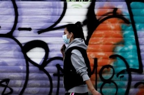 Κορωνοϊός - Γυναίκα με μάσκα προστασίας