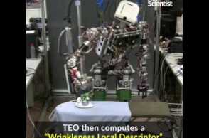 This robot will iron your clothes for you