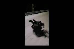 Snowed under? Norway police race each other using shields as sledges