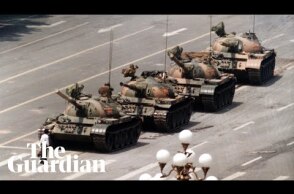Tank Man: hero of 1989 Tiananmen protest stands in front of tanks – archive video